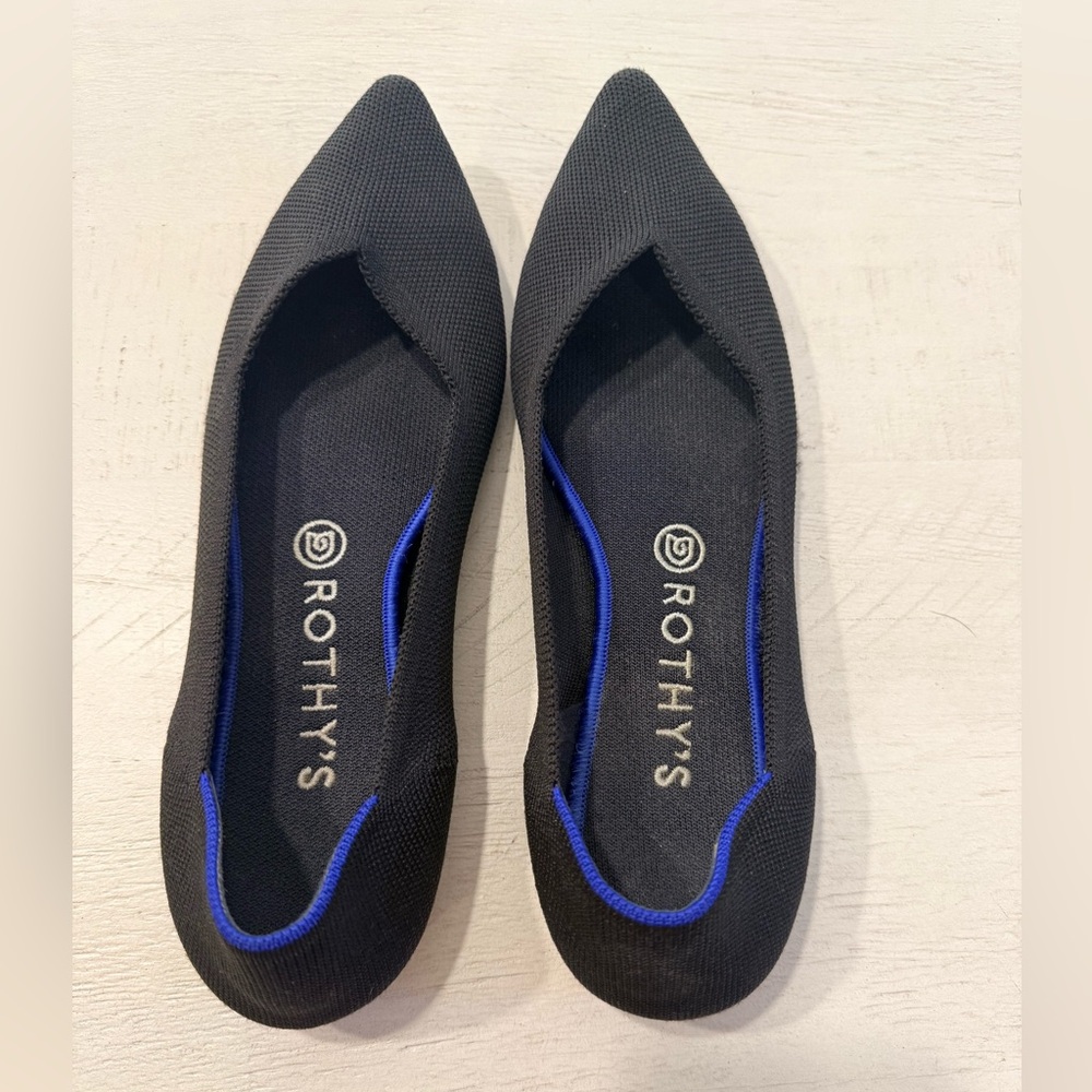 Rothy's Elegant Black Flats with Blue Accent
